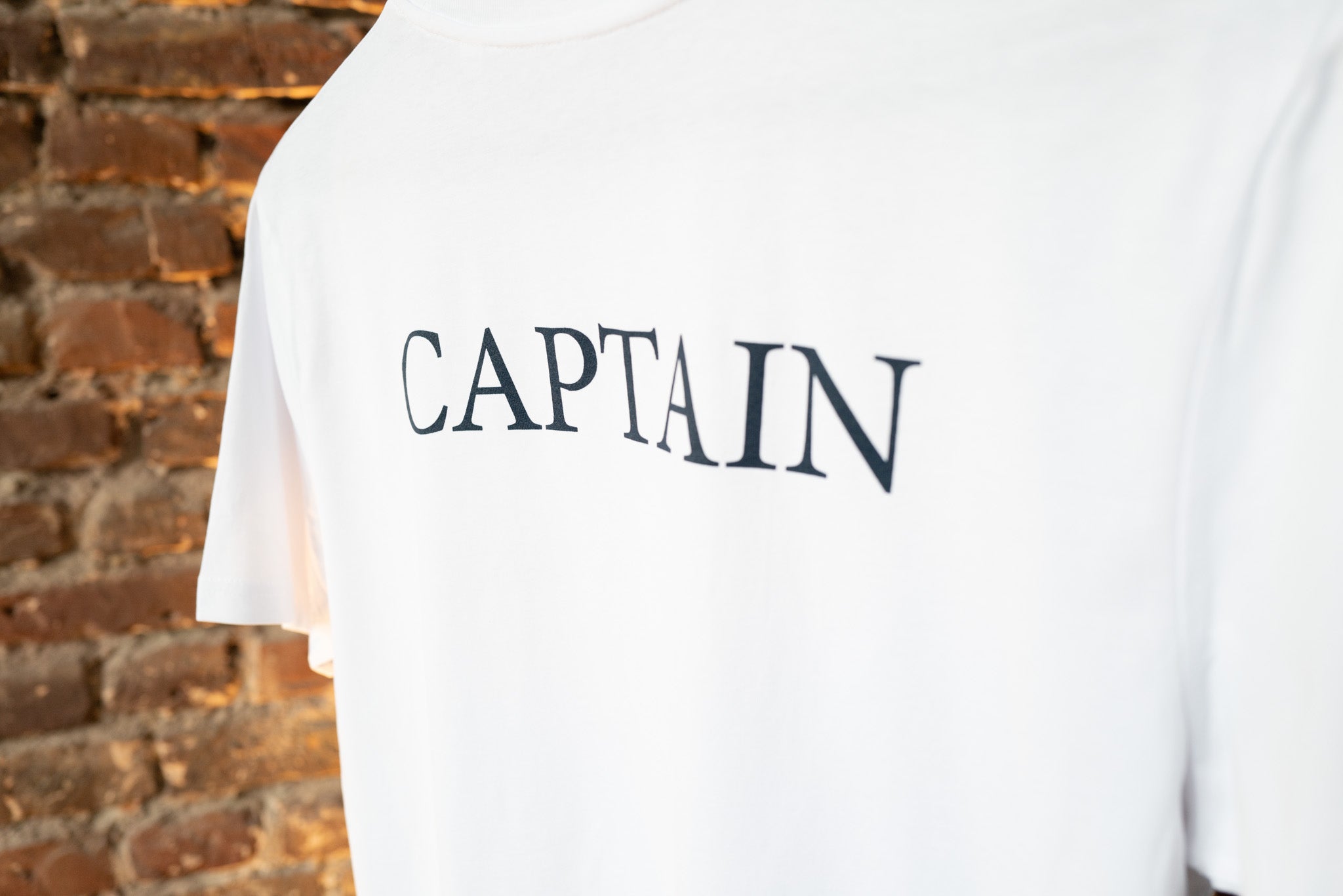 T on sale shirt captain